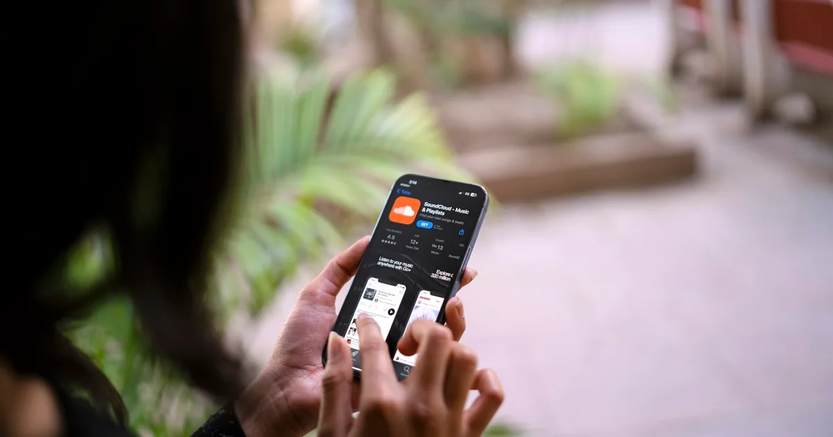 A person checking settings on their iPhone