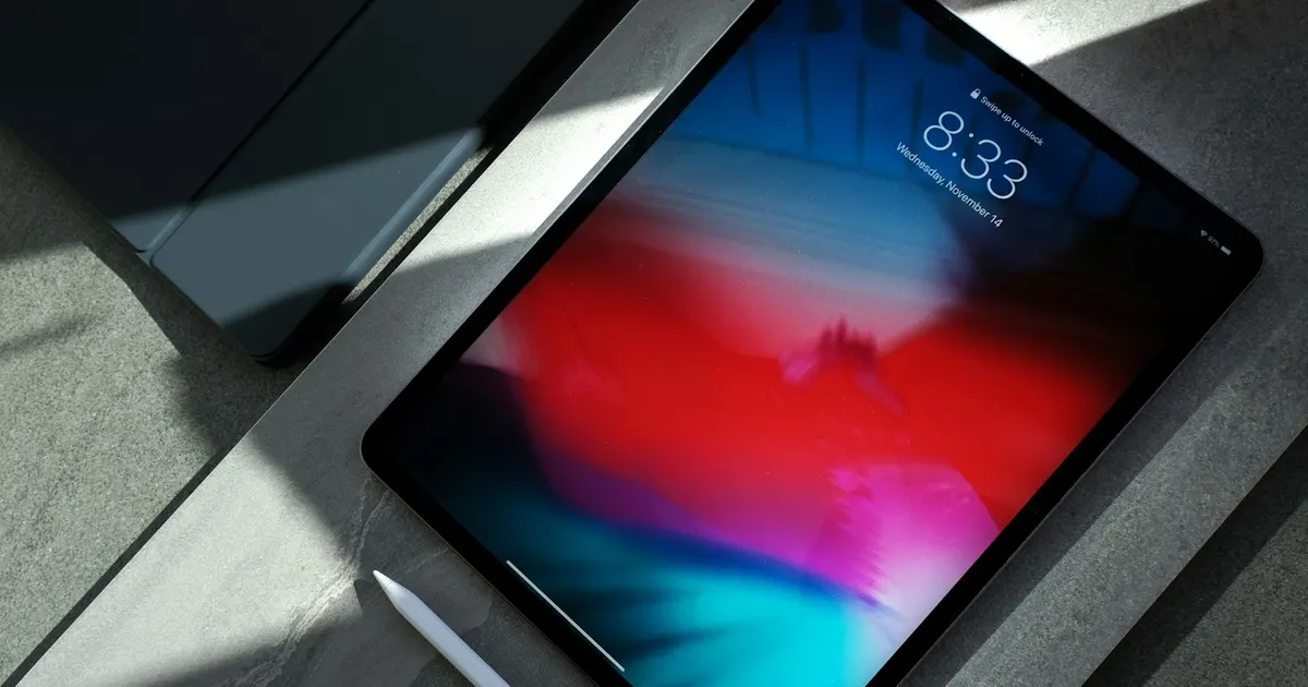 iPad on a desk in dramatic light