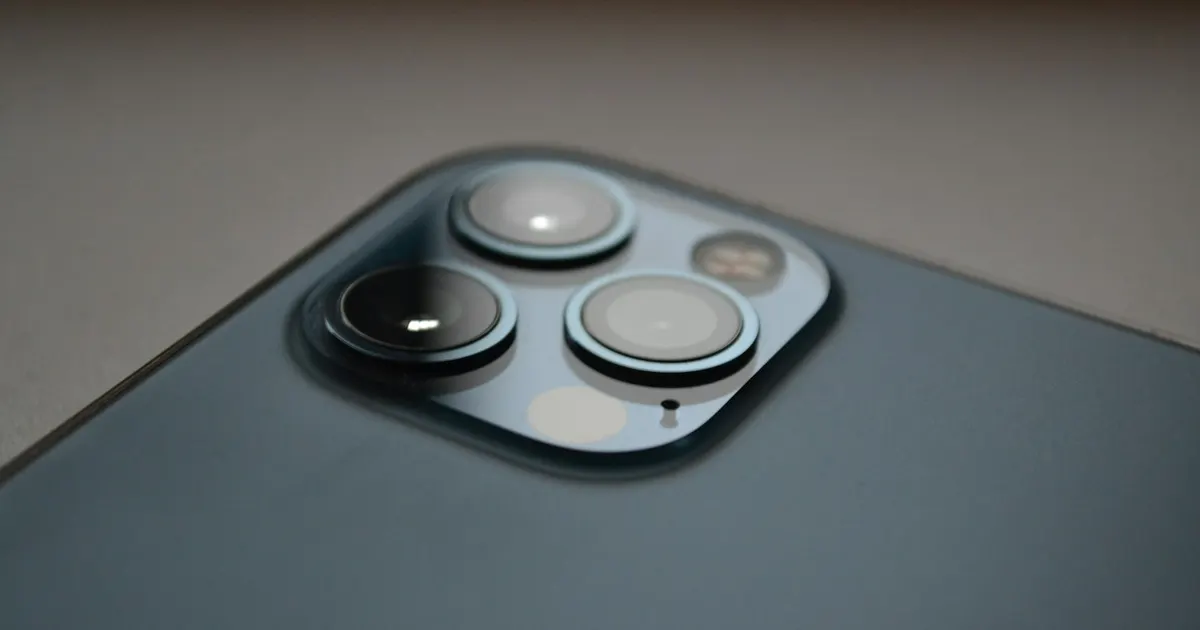 Close-up of an iPhone Pro triple camera module