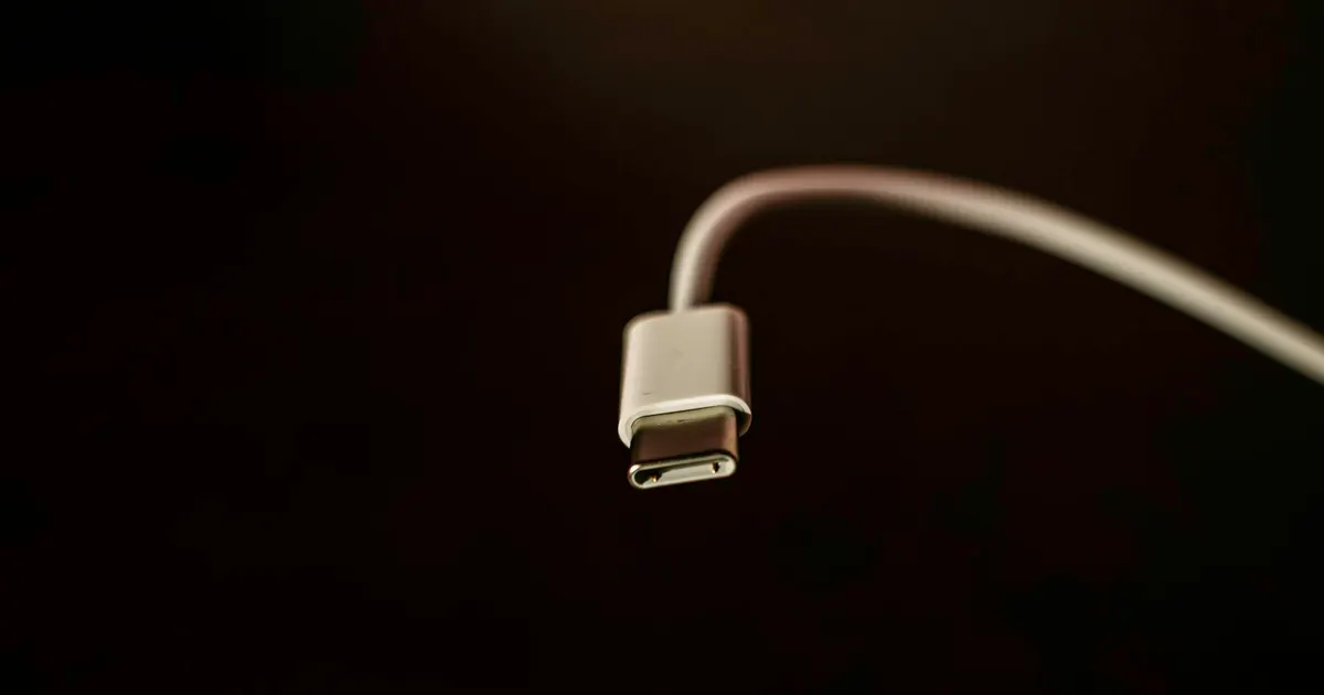 USB-C charging cable connector close-up on a dark background